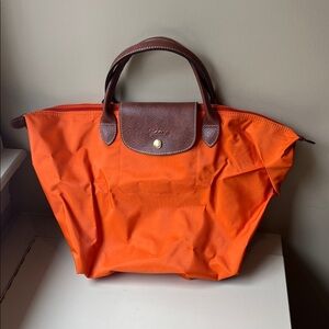 Longchamp Vibrant Orange Tote with Rich Brown Handles